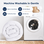 A white folded quilt or comforter sits beside a white front-loading washing machine on a woven rug, with text reading 'Machine Washable in Gentle' and laundry care icons above.