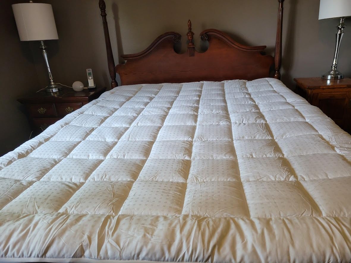 Foto de un cliente de su cama hecha